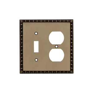 Egg & Dart Switch Plate with Toggle and Outlet in Antique Brass