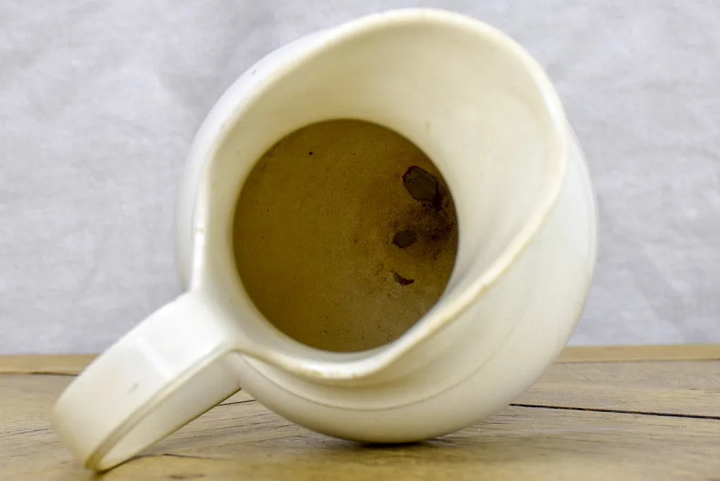 Tall antique French ironstone pitcher