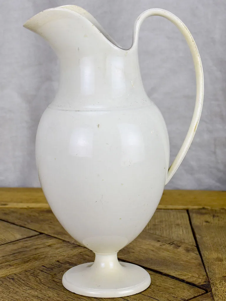 Tall antique French ironstone pitcher