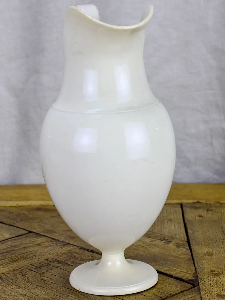 Tall antique French ironstone pitcher